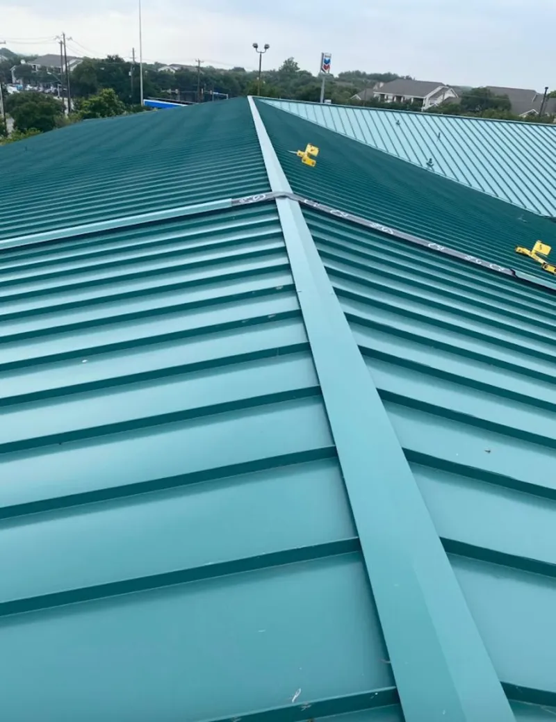 Green commercial metal roof ridge and valley for Metal Roof Repair in East Bridgewater