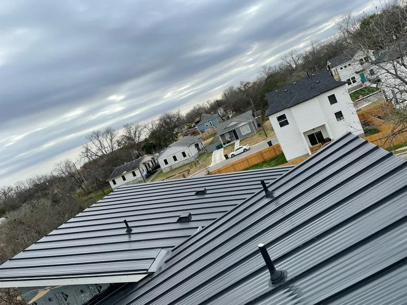 Standing seam metal roof panels with vents for Skylight Repair in East Bridgewater